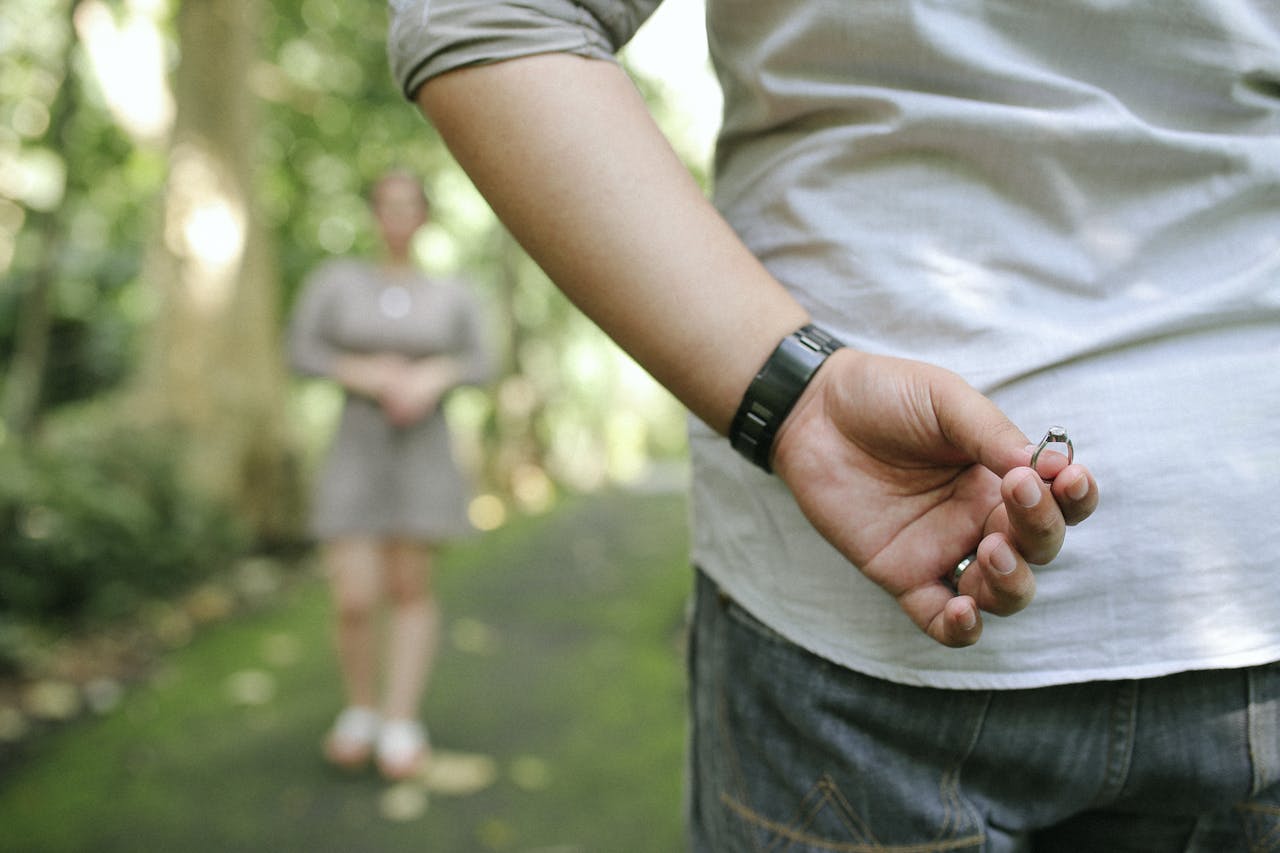Close-Up Photo of Person Holding Ring